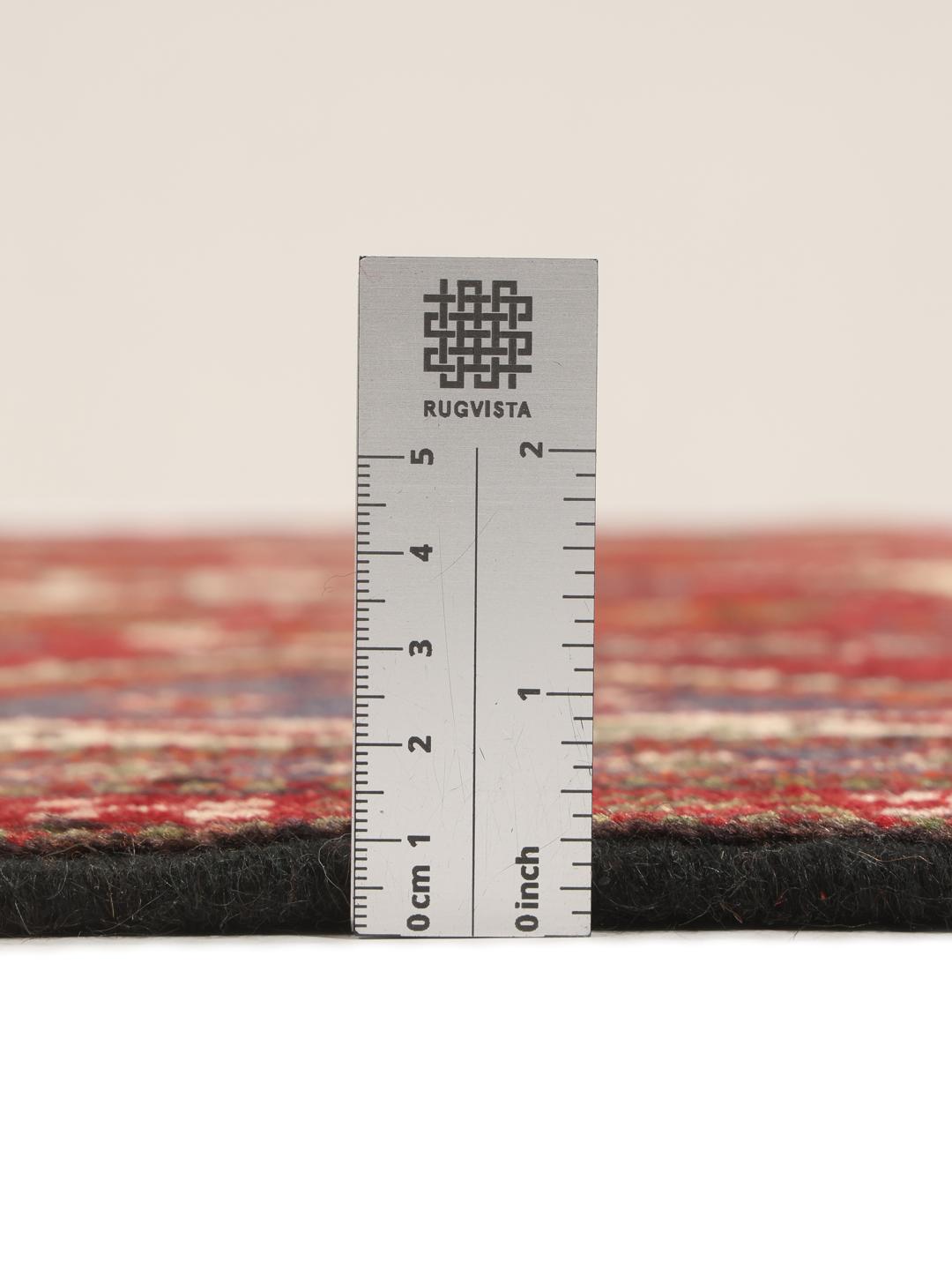 Hand-knotted Ghashghai rug from the Middle East in red