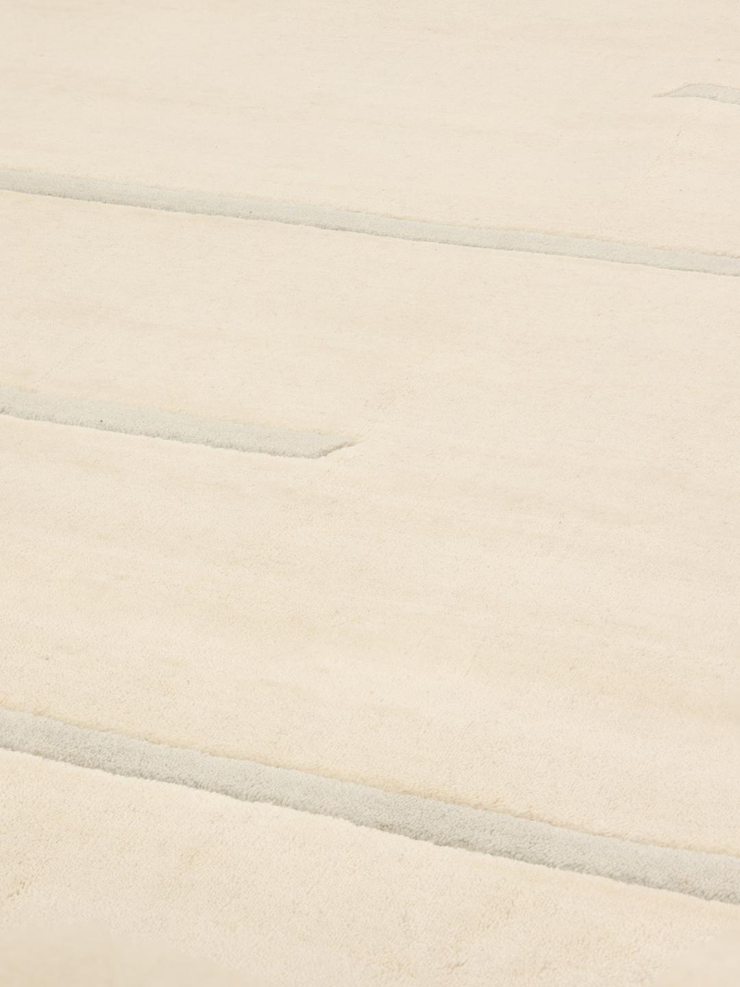 Modern beige handgeweven tapijt met minimalistische lijnen uit India