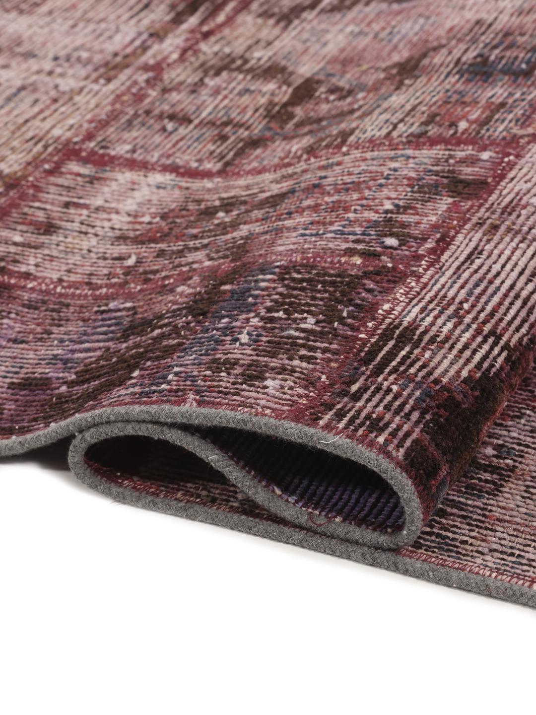 Handgemaakt patchwork tapijt uit het Midden-Oosten in donkerrood