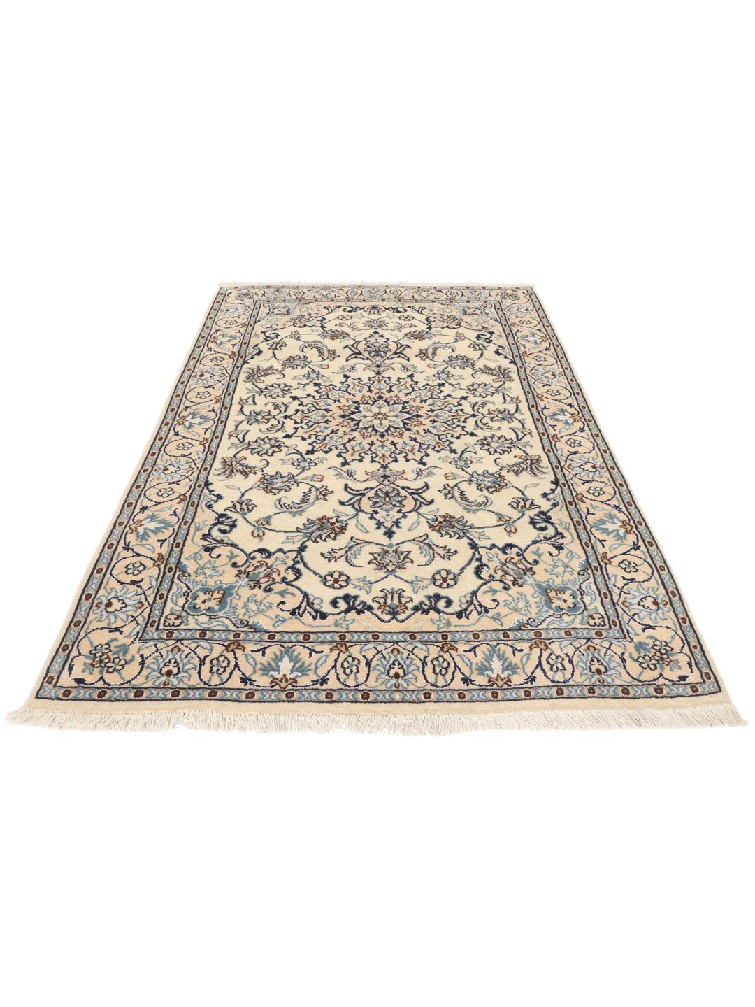 Hand-knotted Nain rug from the Middle East in beige with floral patterns