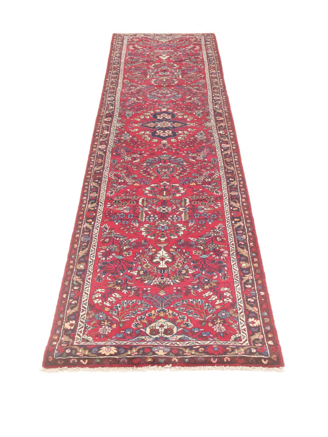 Een handgeknoopte Mehraban loper in rood met traditionele bloempatronen uit het Midden-Oosten.