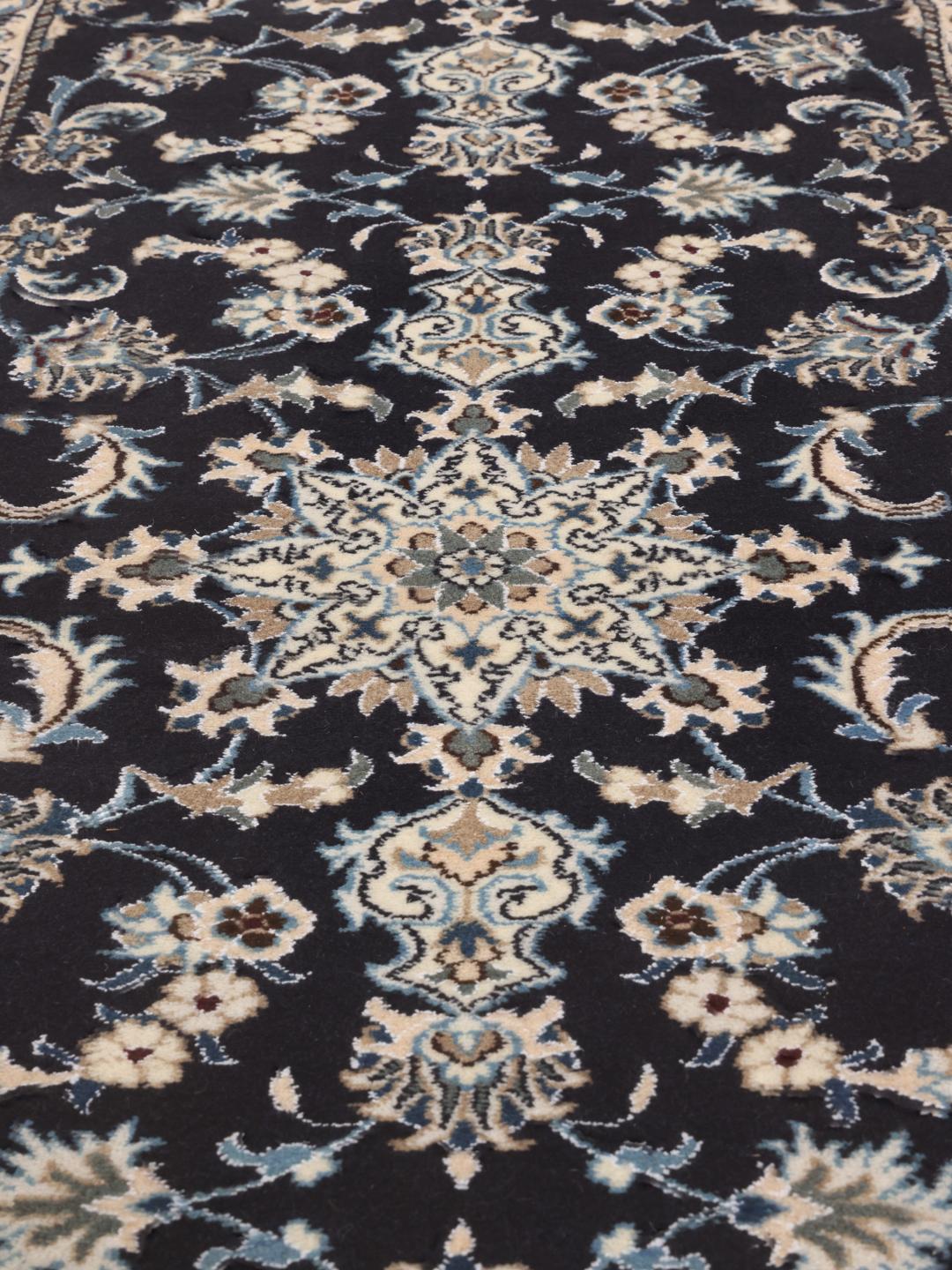 Hand-knotted Nain runner in dark blue from the Middle East