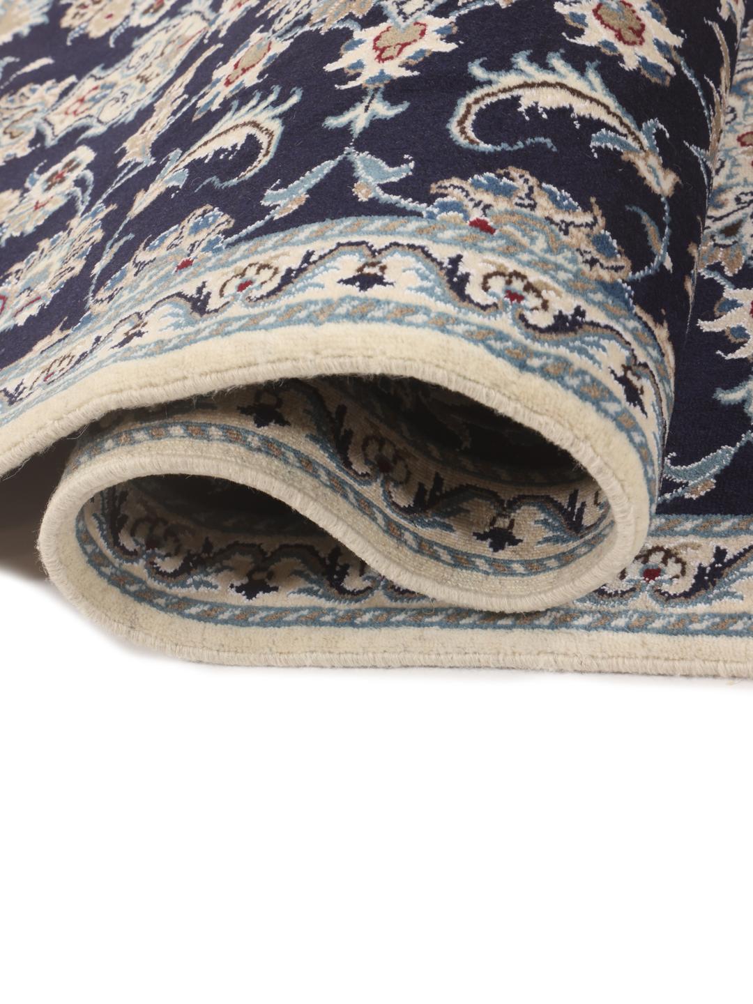 Hand-knotted Nain runner with floral motifs in dark blue