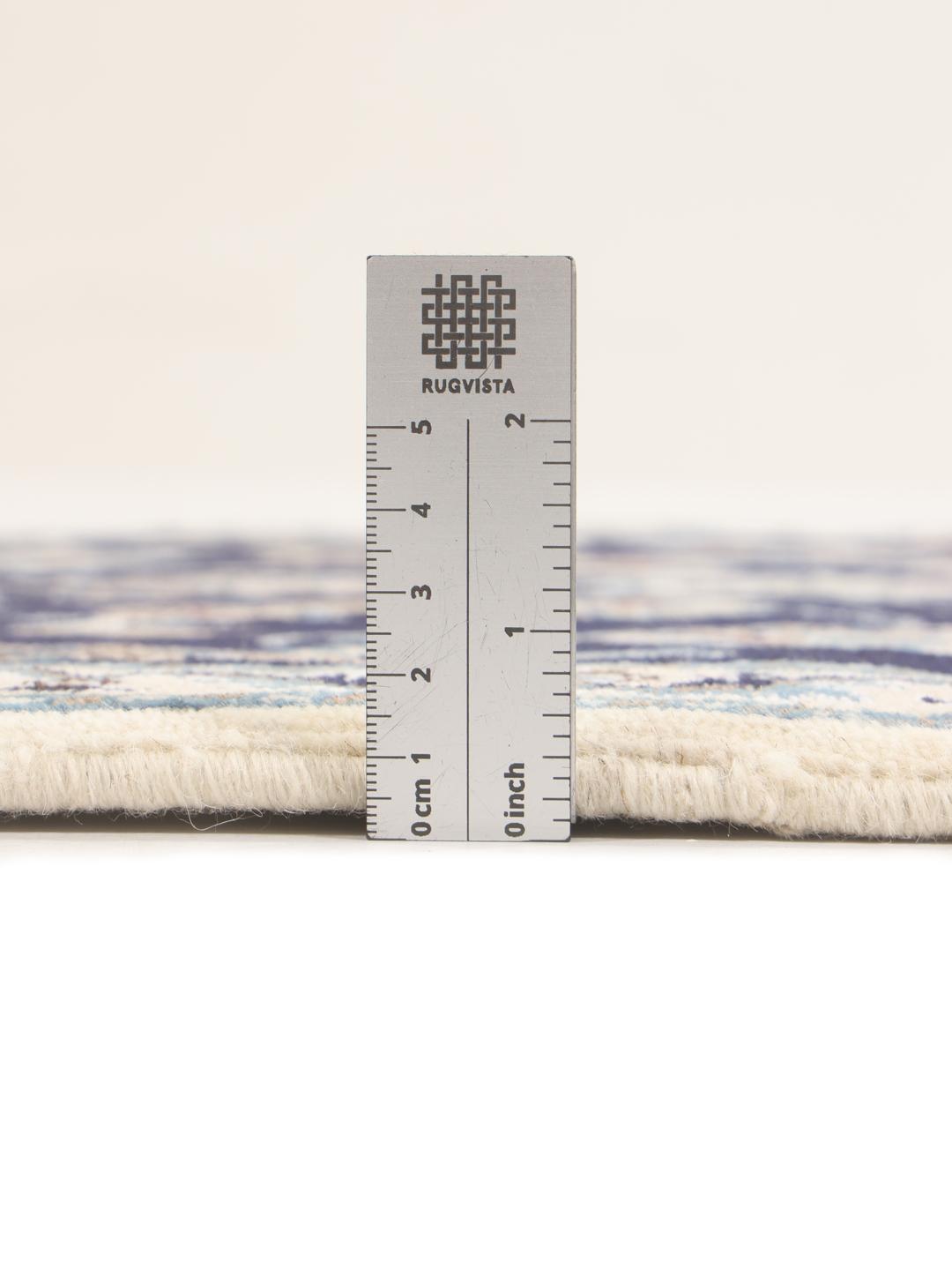 Hand-knotted Nain runner with floral motifs in dark blue