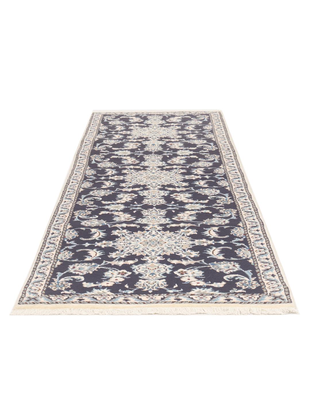 Hand-knotted Nain runner in dark blue from the Middle East