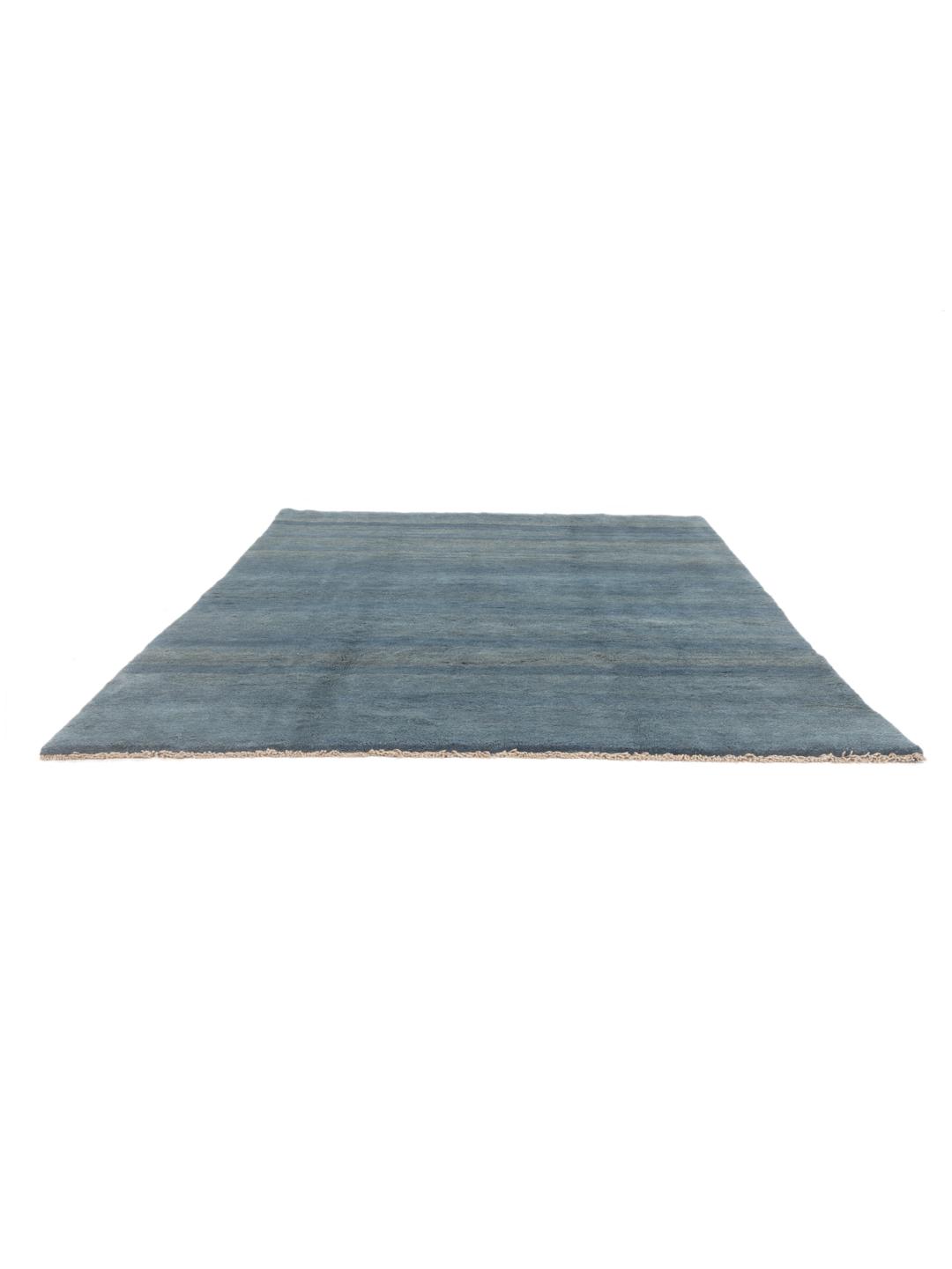 Handgeknoopt blauw wollen vloerkleed uit het Midden-Oosten met een zachte, dichte pool.