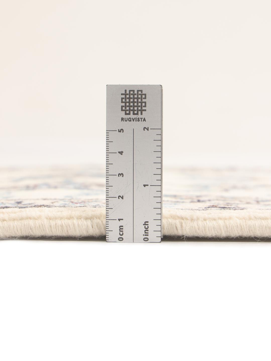 Hand-knotted Nain runner with floral motifs in beige and blue