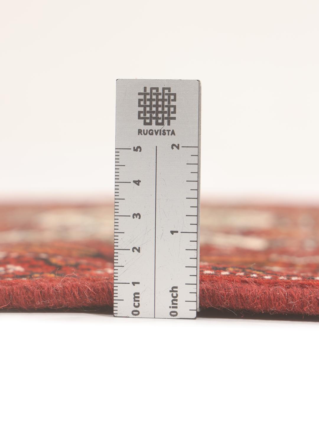Hand-knotted Turkaman runner with traditional geometric patterns in rich red tones from the Middle East