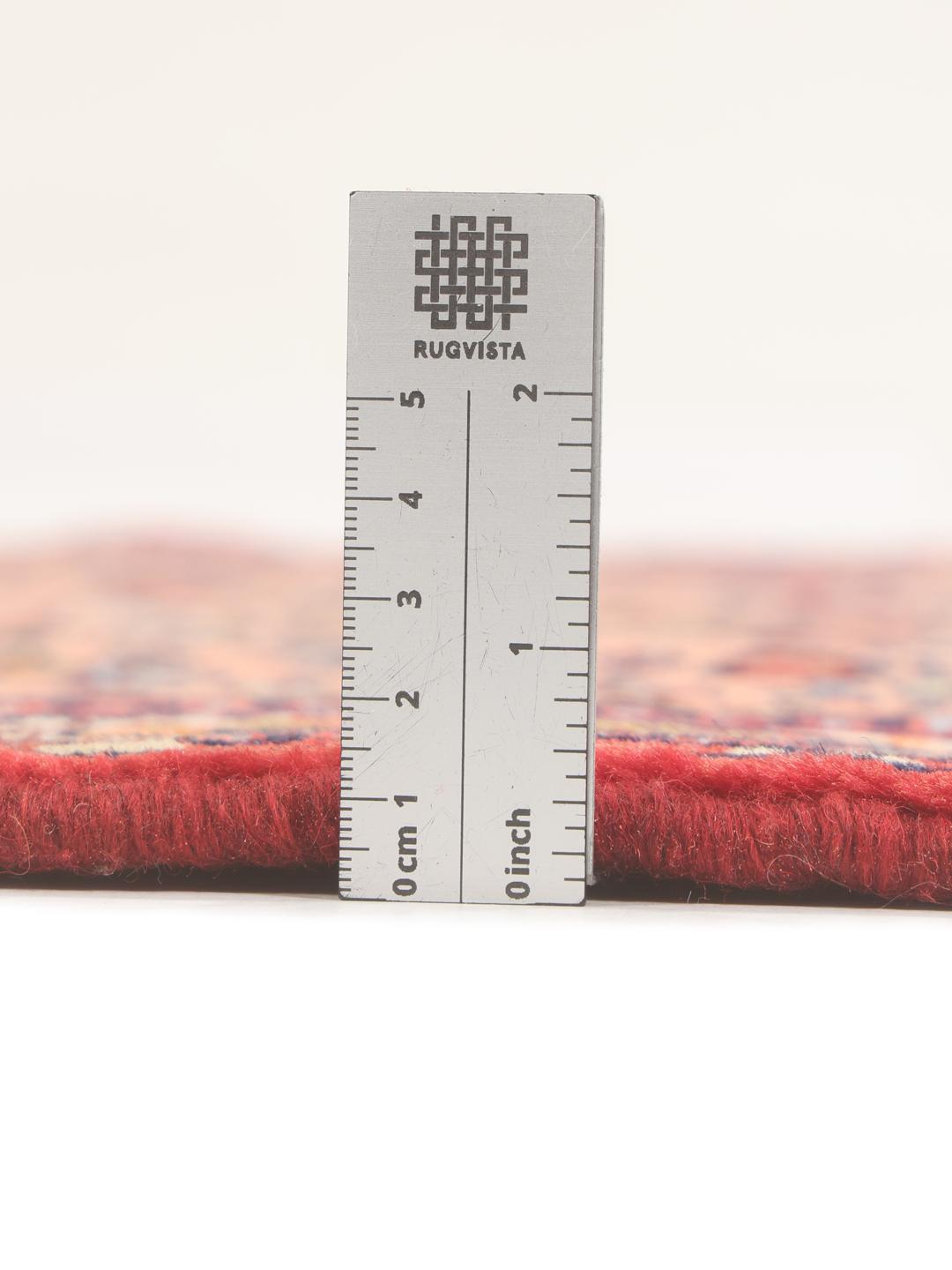 Hand-knotted Middle Eastern runner in red with geometric medallions