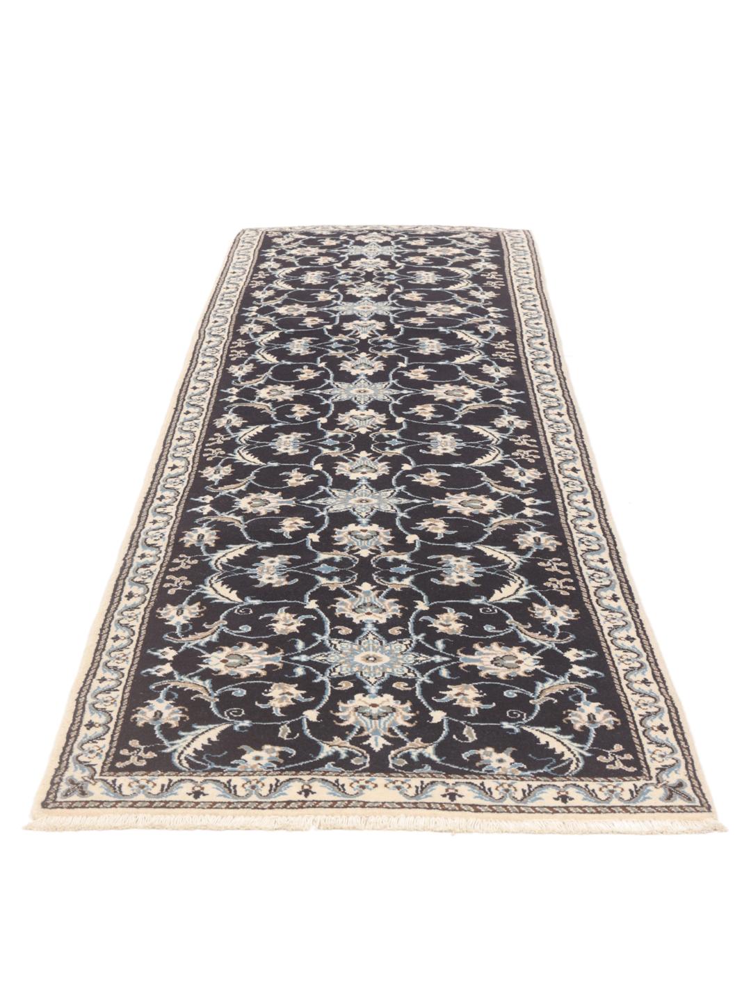 Hand-knotted Nain runner with floral patterns in dark blue and beige tones