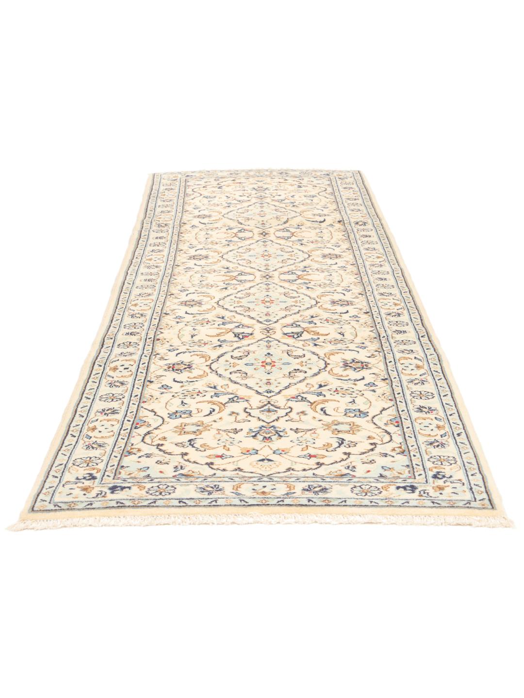 A sophisticated Keshan runner with intricate floral patterns in beige and blue from the Middle East.