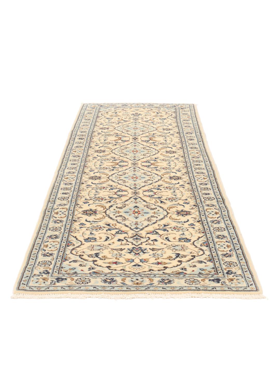A sophisticated Keshan runner with intricate floral patterns in beige and blue from the Middle East.