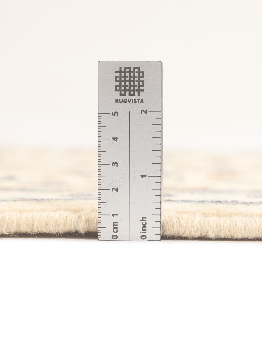 A sophisticated Keshan runner with intricate floral patterns in beige and blue from the Middle East.