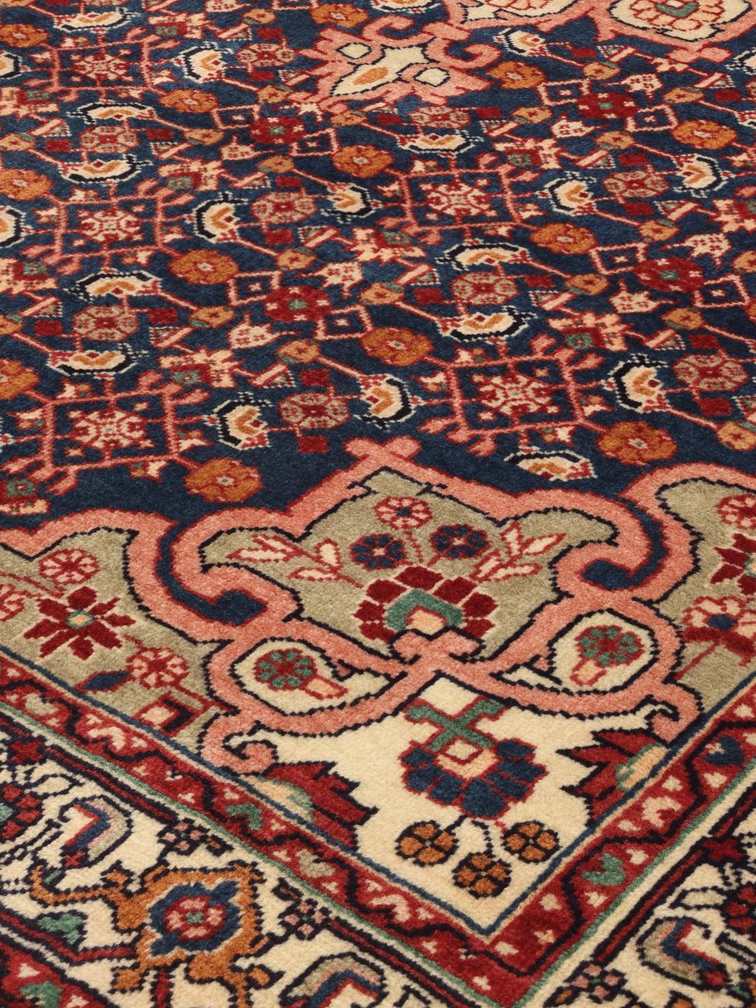 Hand-knotted Bidjar rug from the Middle East in blue and red tones
