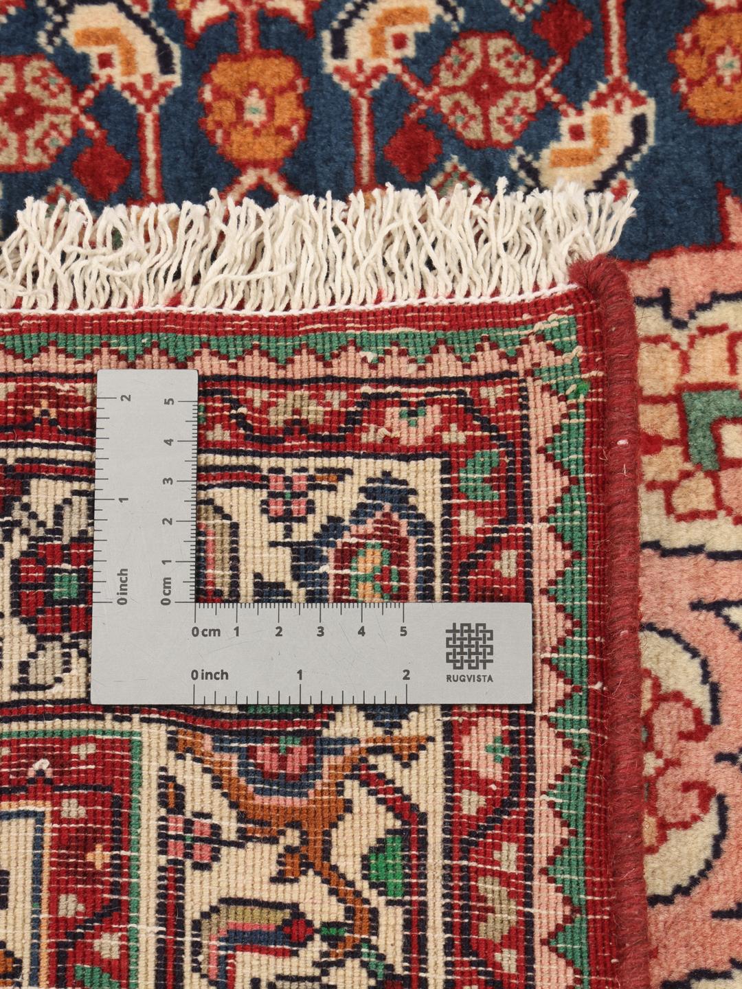 Hand-knotted Bidjar rug from the Middle East in blue and red tones