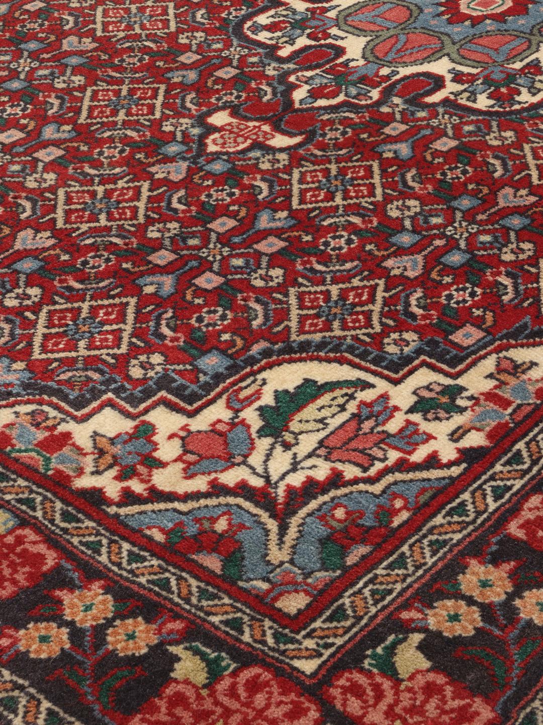Hand-knotted Bidjar rug from the Middle East in deep red and blue tones