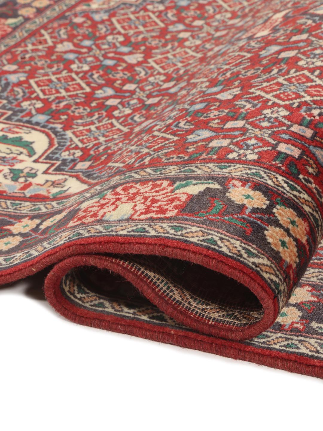 Hand-knotted Bidjar rug from the Middle East in deep red and blue tones