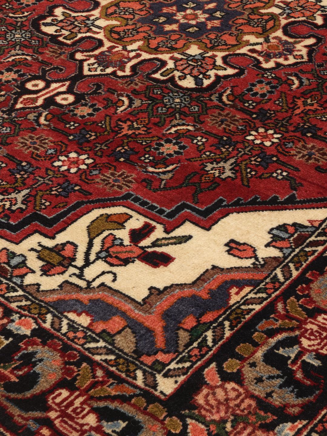 Hand knotted Bidjar rug from the Middle East in deep red tones