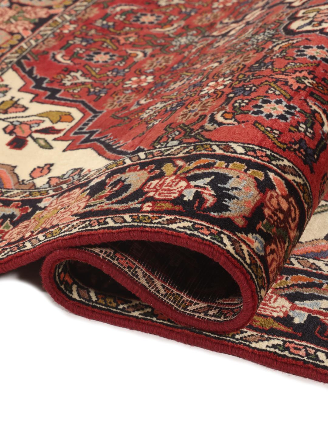 Hand knotted Bidjar rug from the Middle East in deep red tones