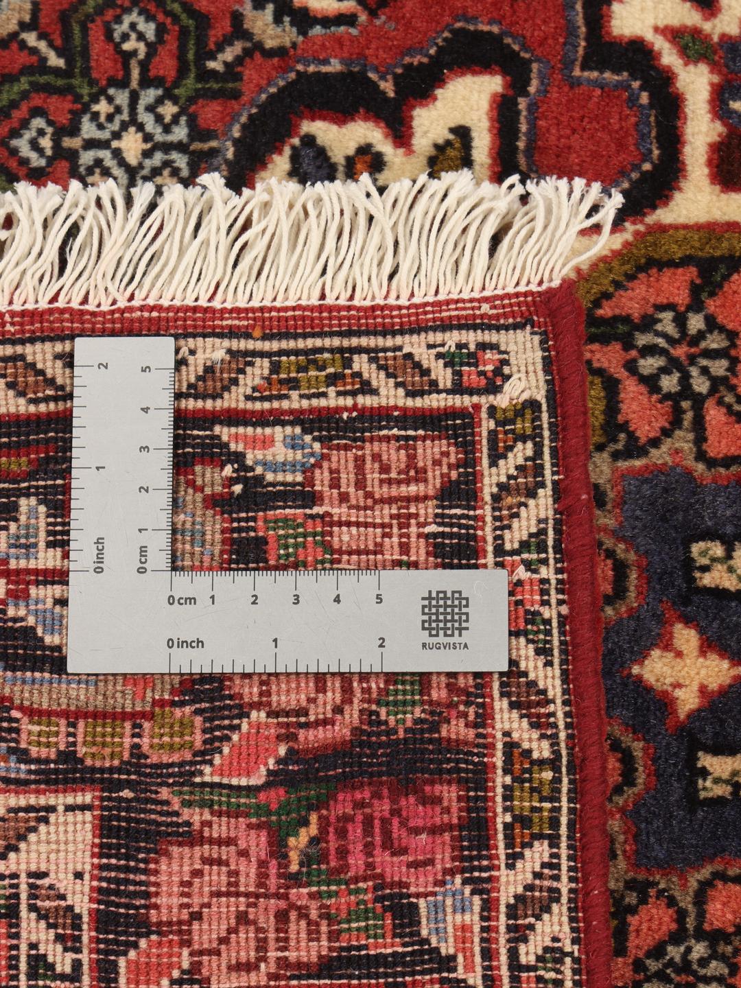 Hand knotted Bidjar rug from the Middle East in deep red tones