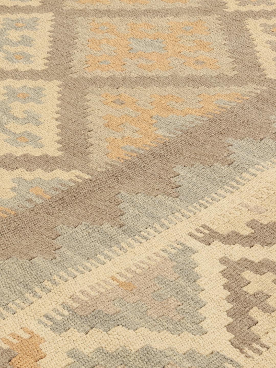 Tapis Kilim tissé à la main du Moyen-Orient dans des tons beige et bleu