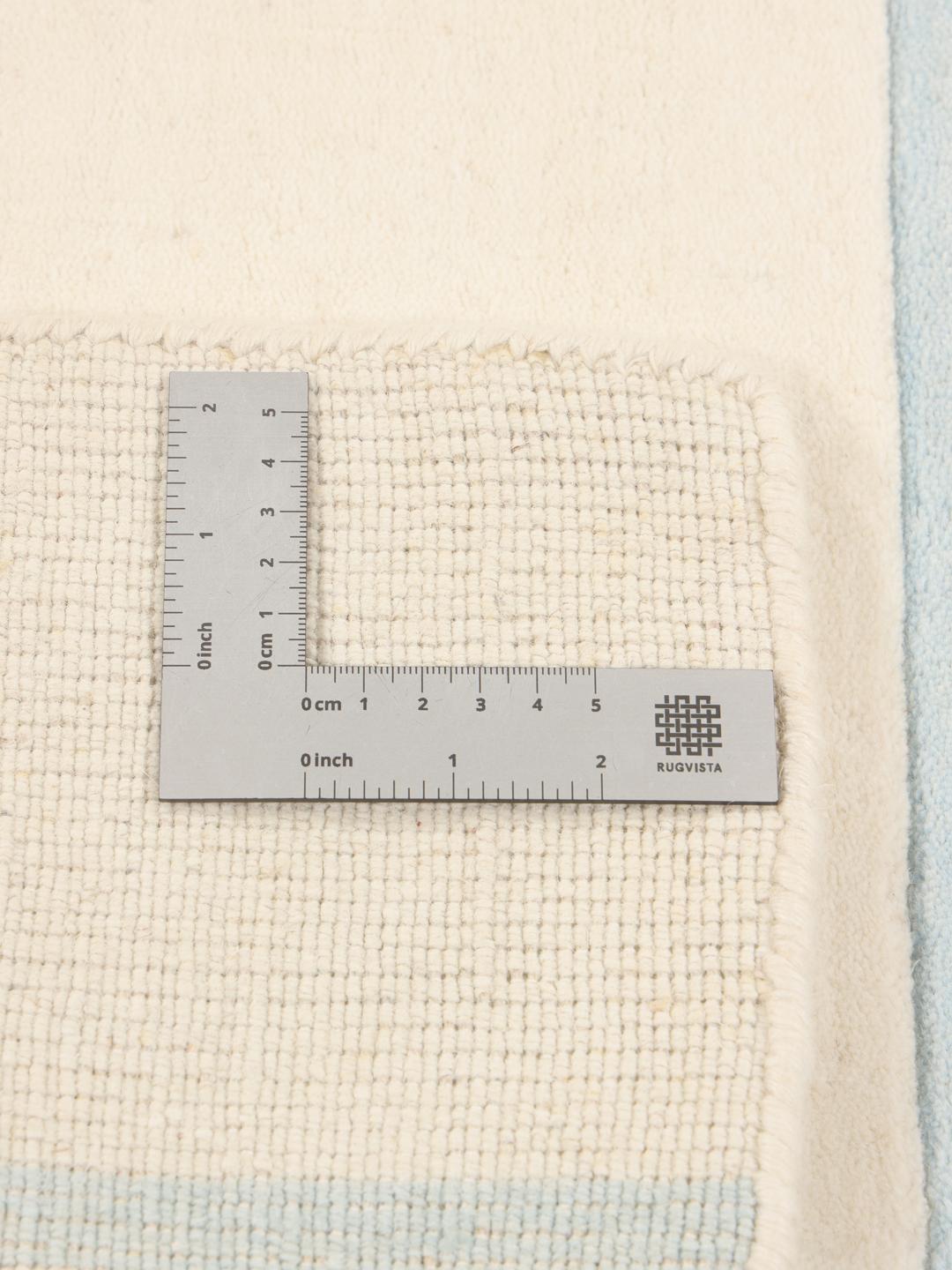 Handloom Pattern vloerkleed uit India in beige en lichtblauw
