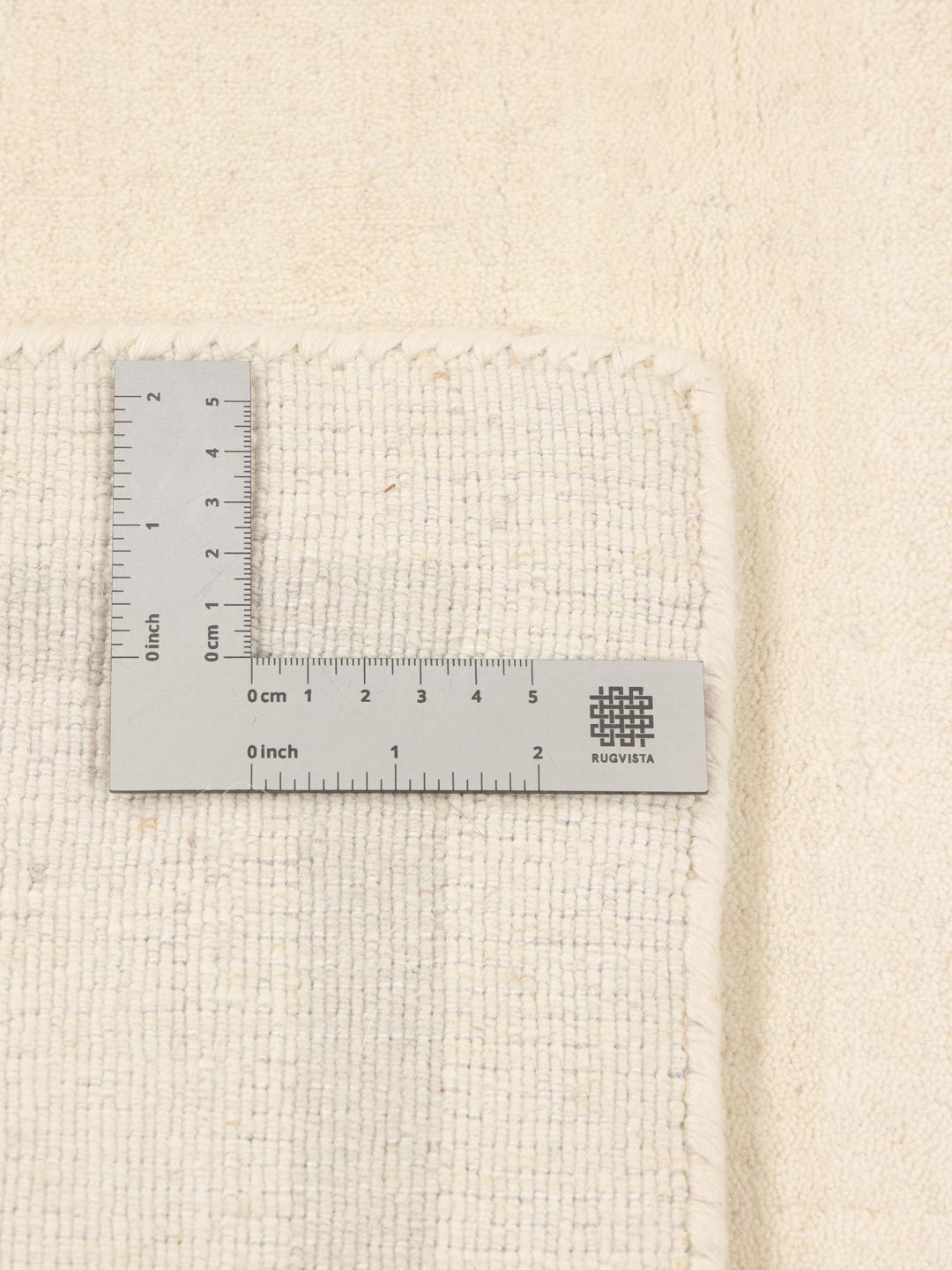 Hand-loomed modern rug from India in beige