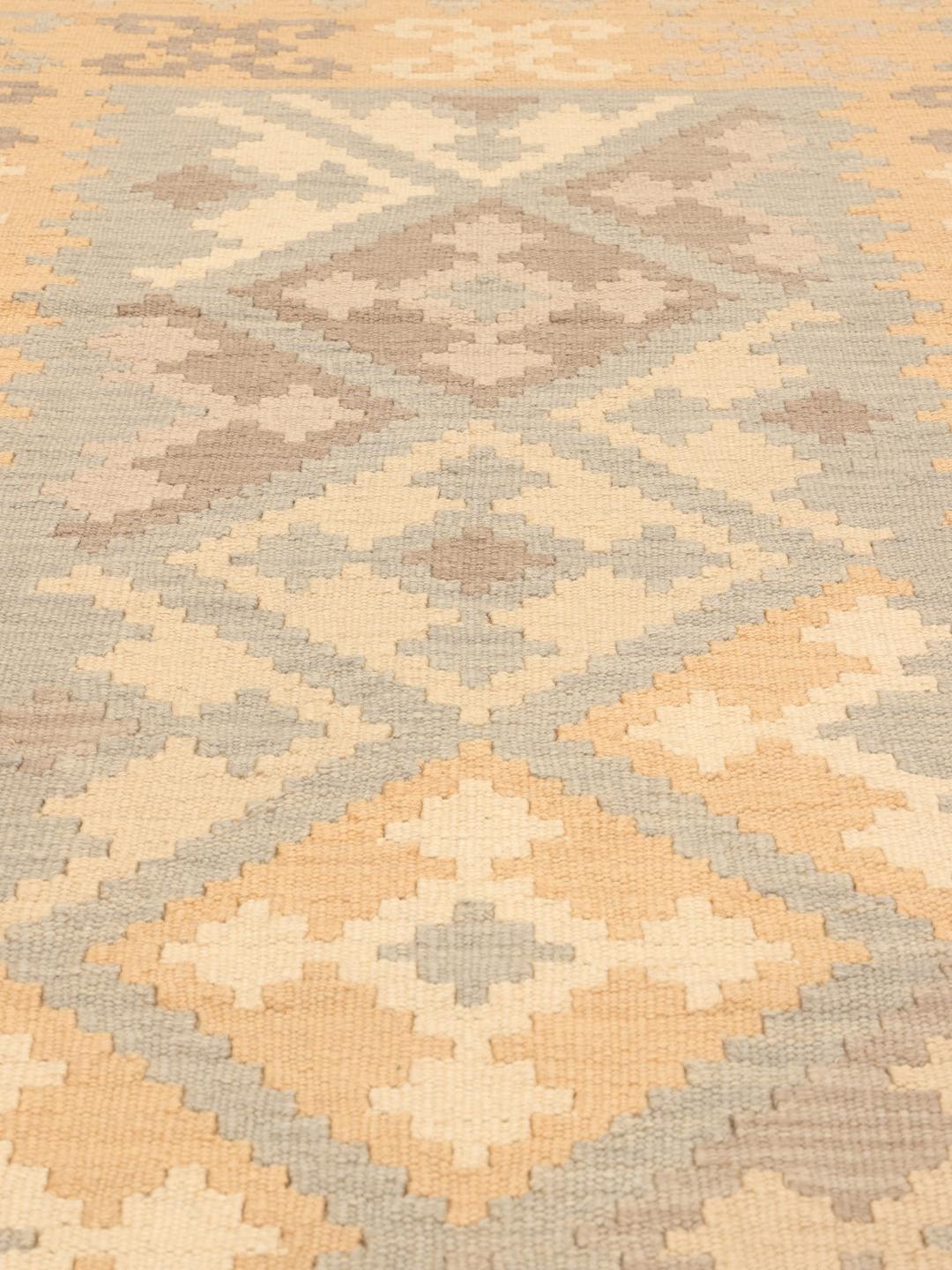 Hand-woven Ghashghai Kelim rug in beige and brown tones from the Middle East
