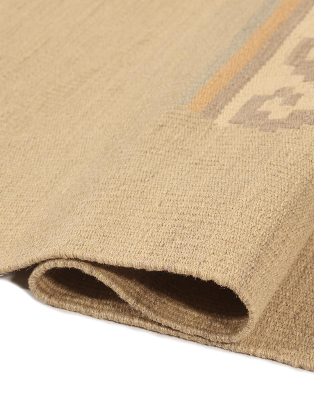 Runner mediorientale beige tessuto a mano con motivi geometrici tribali