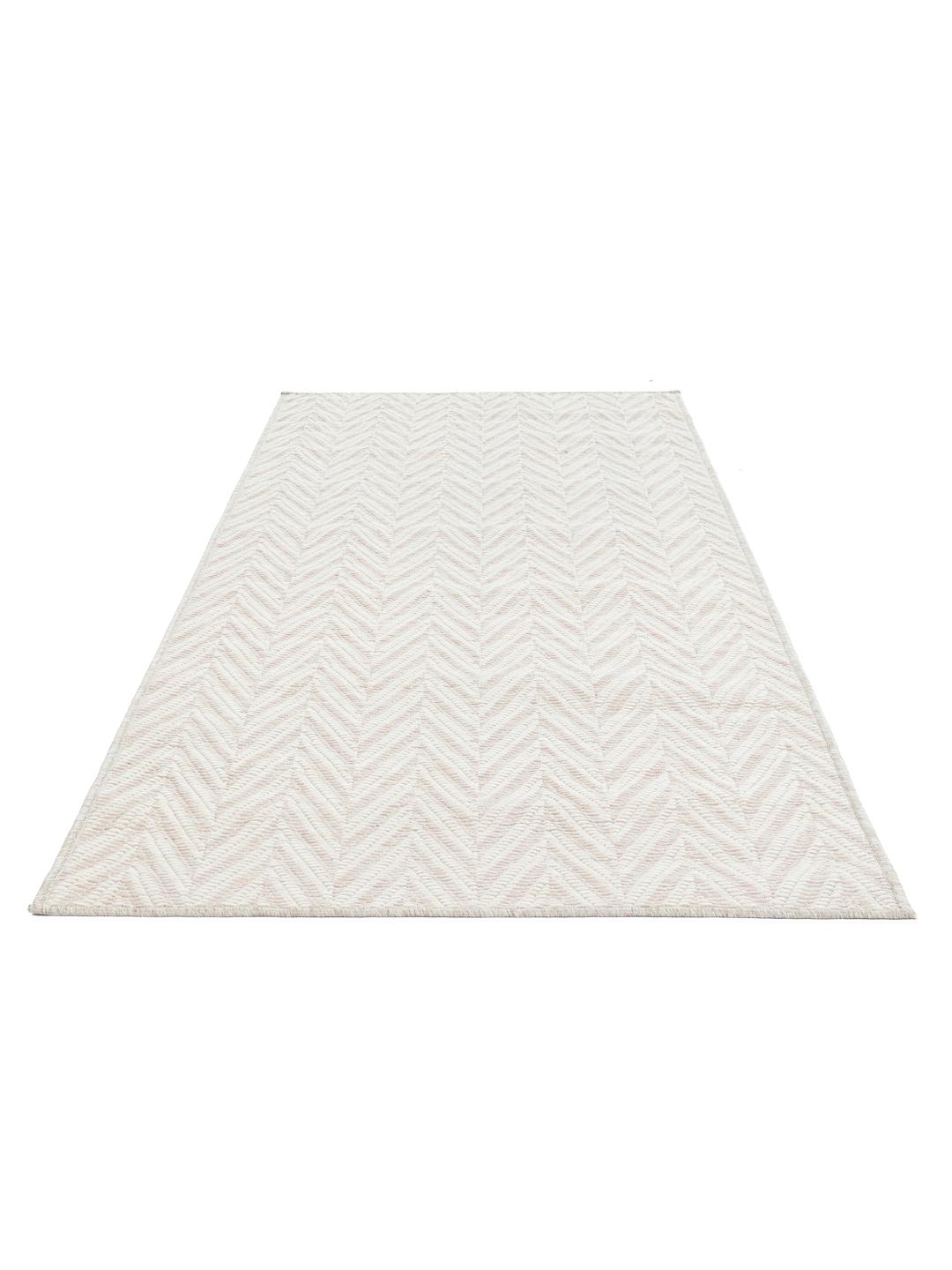 Beige en witte loper met een gestructureerd chevronpatroon