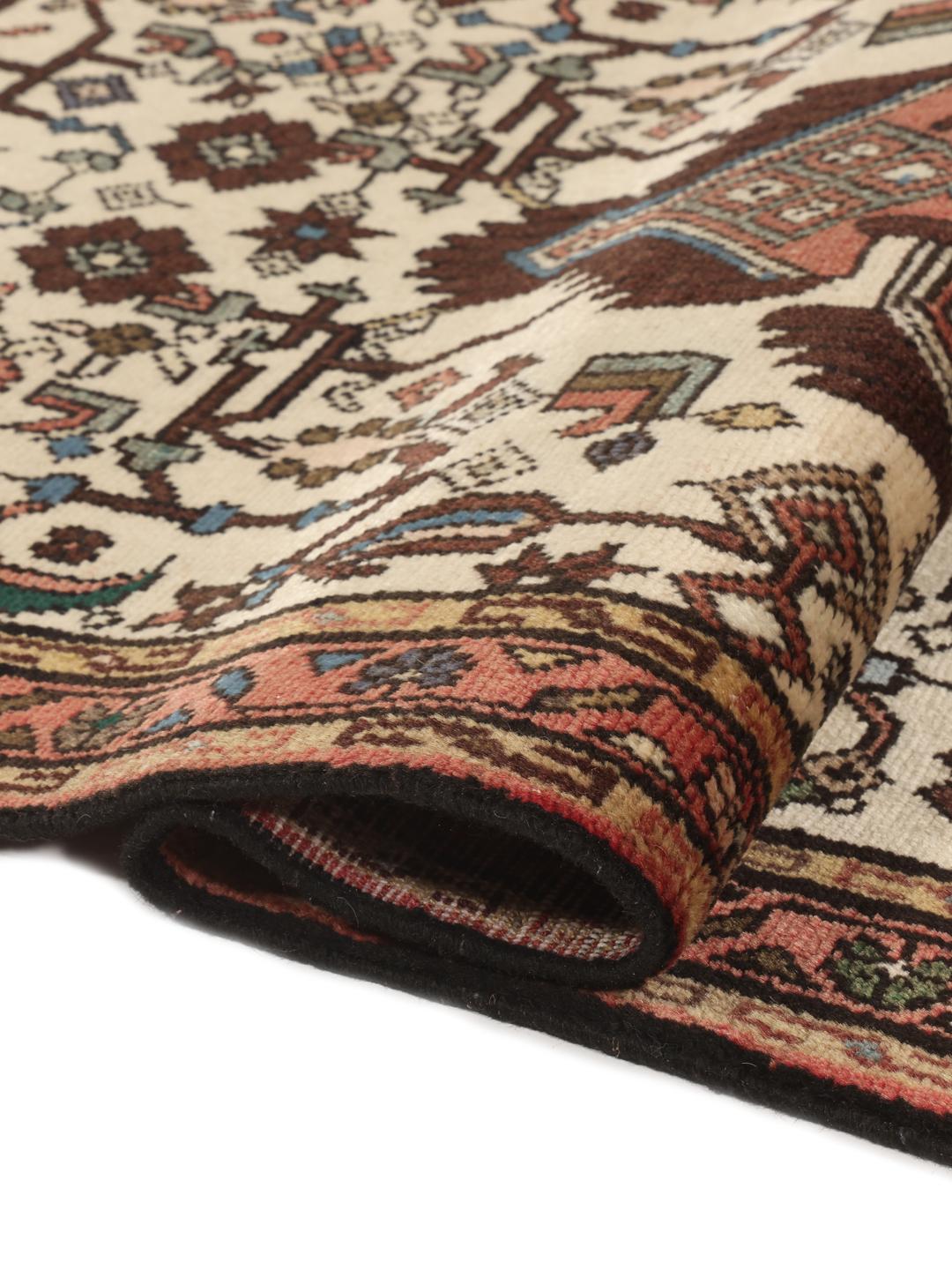 Handgeknoopte loper uit het Midden-Oosten met geometrische motieven in beige en donkerrode tinten