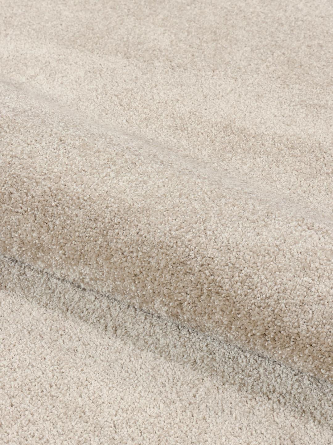 beiger Teppich