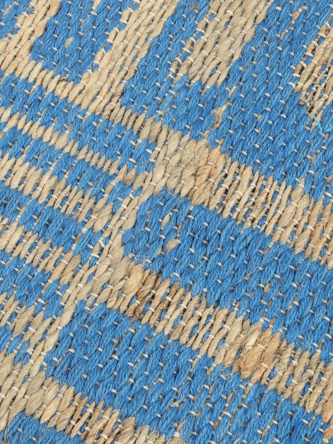 Tapis tissé à la main en bleu et beige avec un motif à rayures