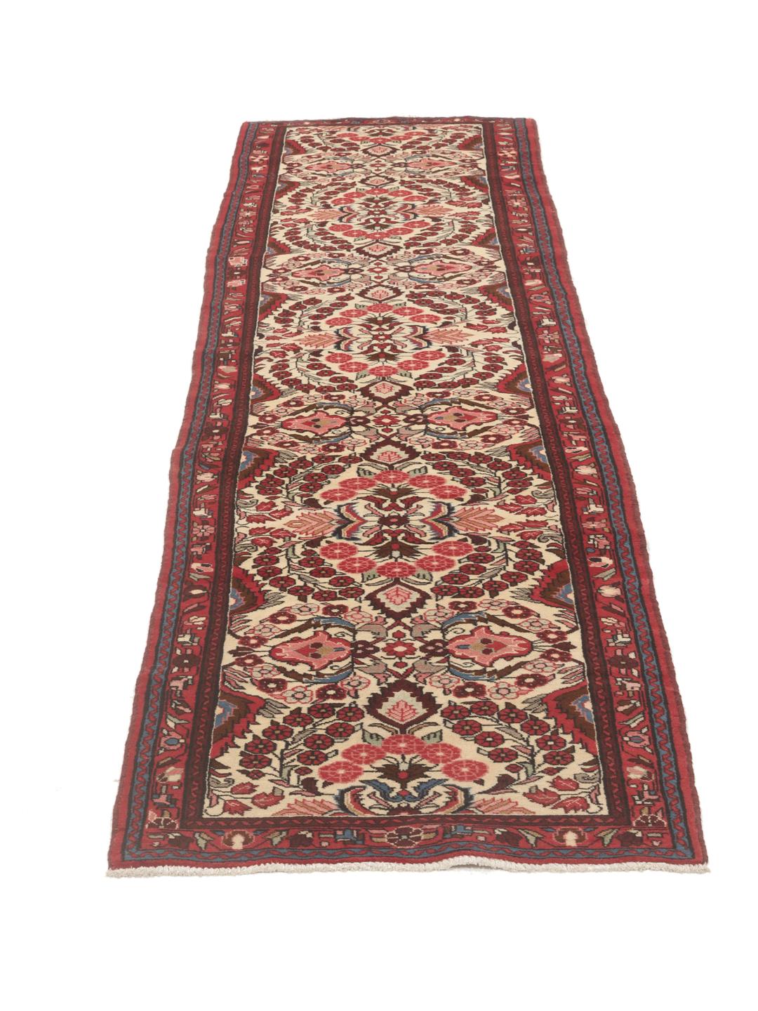 Tapis couloir Mehraban noué à la main en rouge avec des motifs floraux traditionnels