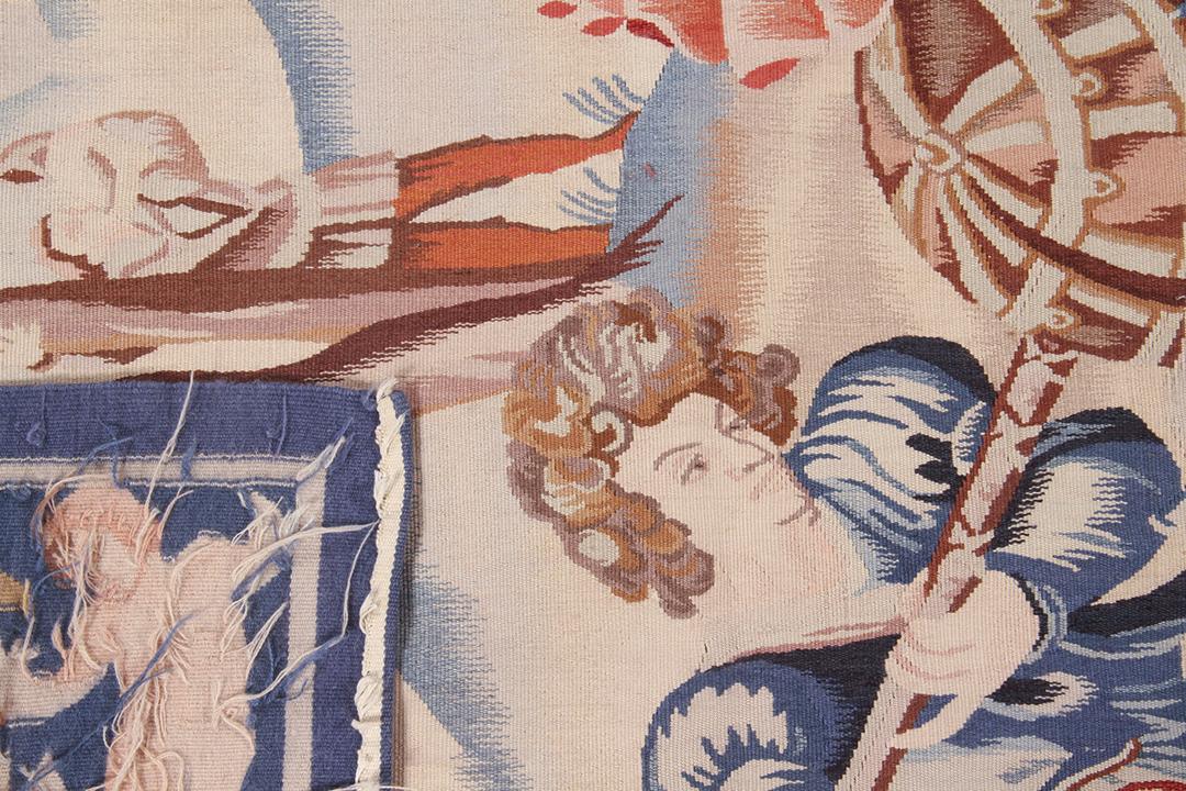 Handgeweven Kilim tapijt uit China met een klassiek jachttafereel in blauwe en aardse tinten.