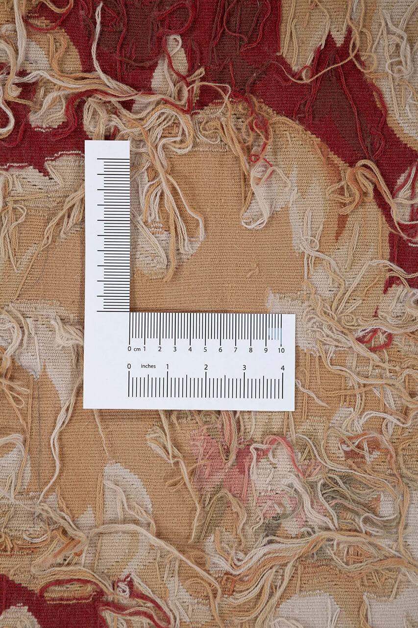 Håndvævet kelimtæppe fra Kina med blomstermotiver i rød og beige