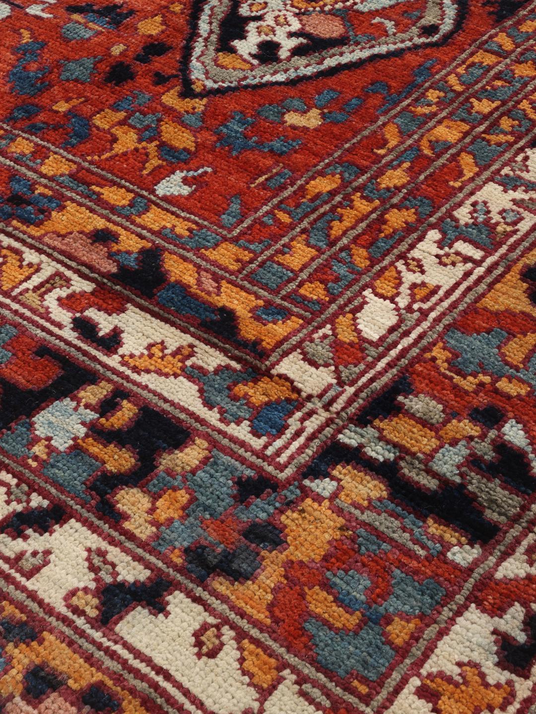 Handgeknoopt Kazak-tapijt uit Afghanistan in levendige rode tinten