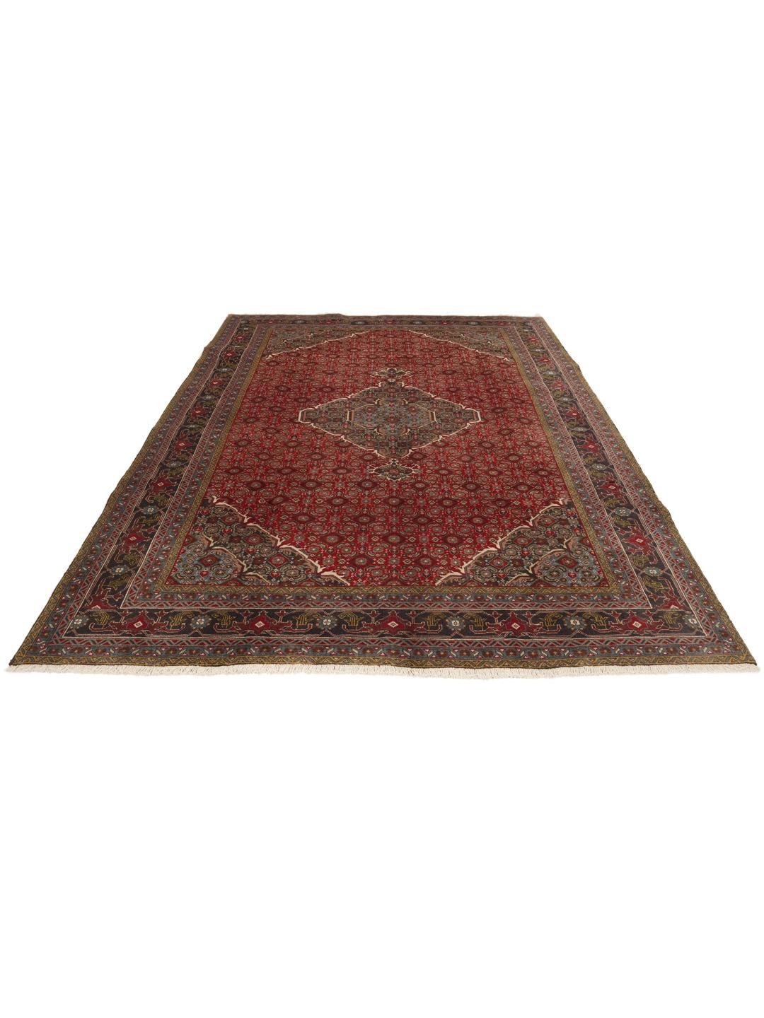 Hand-knotted Tabriz rug from the Middle East in deep red and blue tones