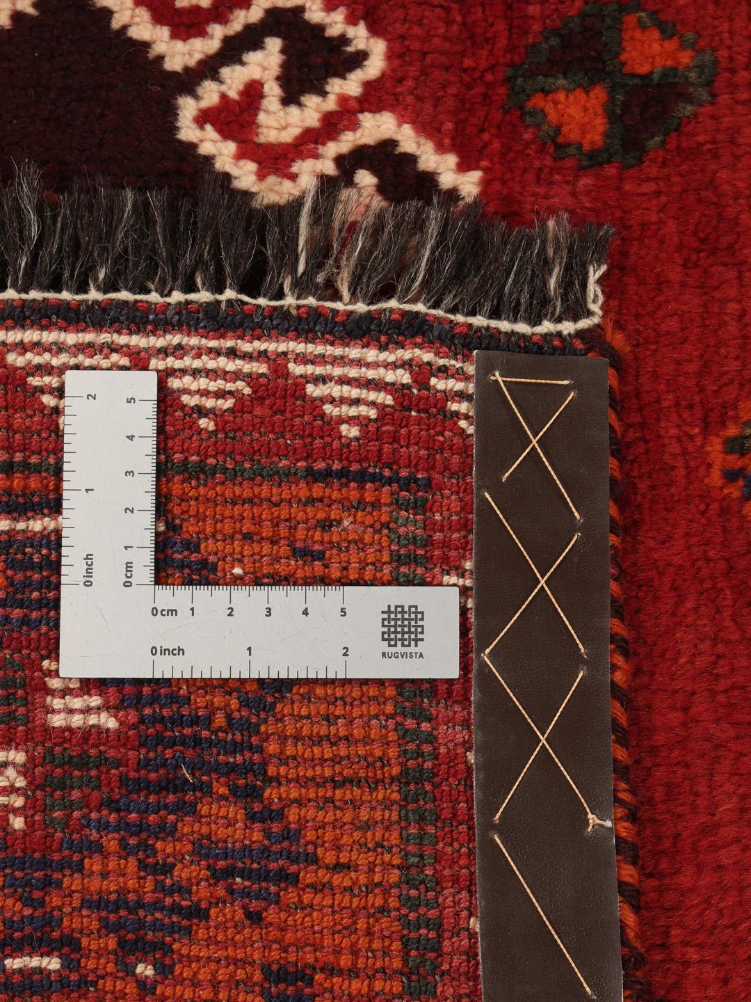 Handgemaakt Shiraz-tapijt uit het Midden-Oosten in donkerrood met tribale geometrische patronen
