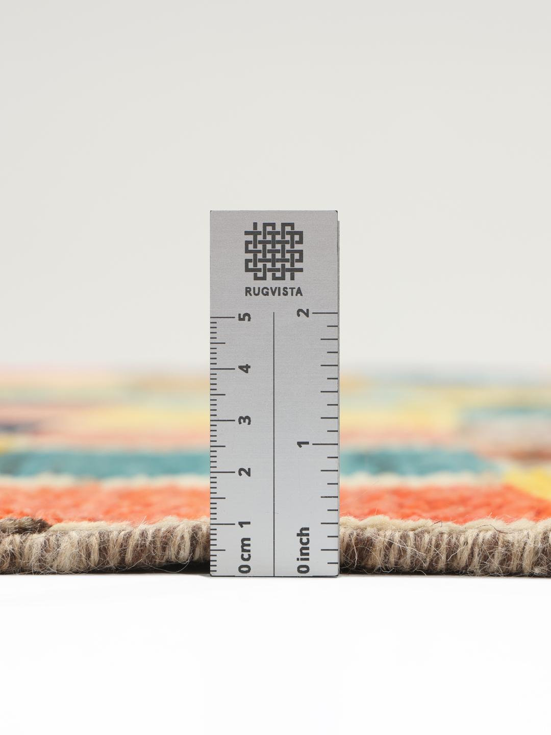 Tapis berbère coloré noué à la main provenant d'Afghanistan avec un motif patchwork géométrique.