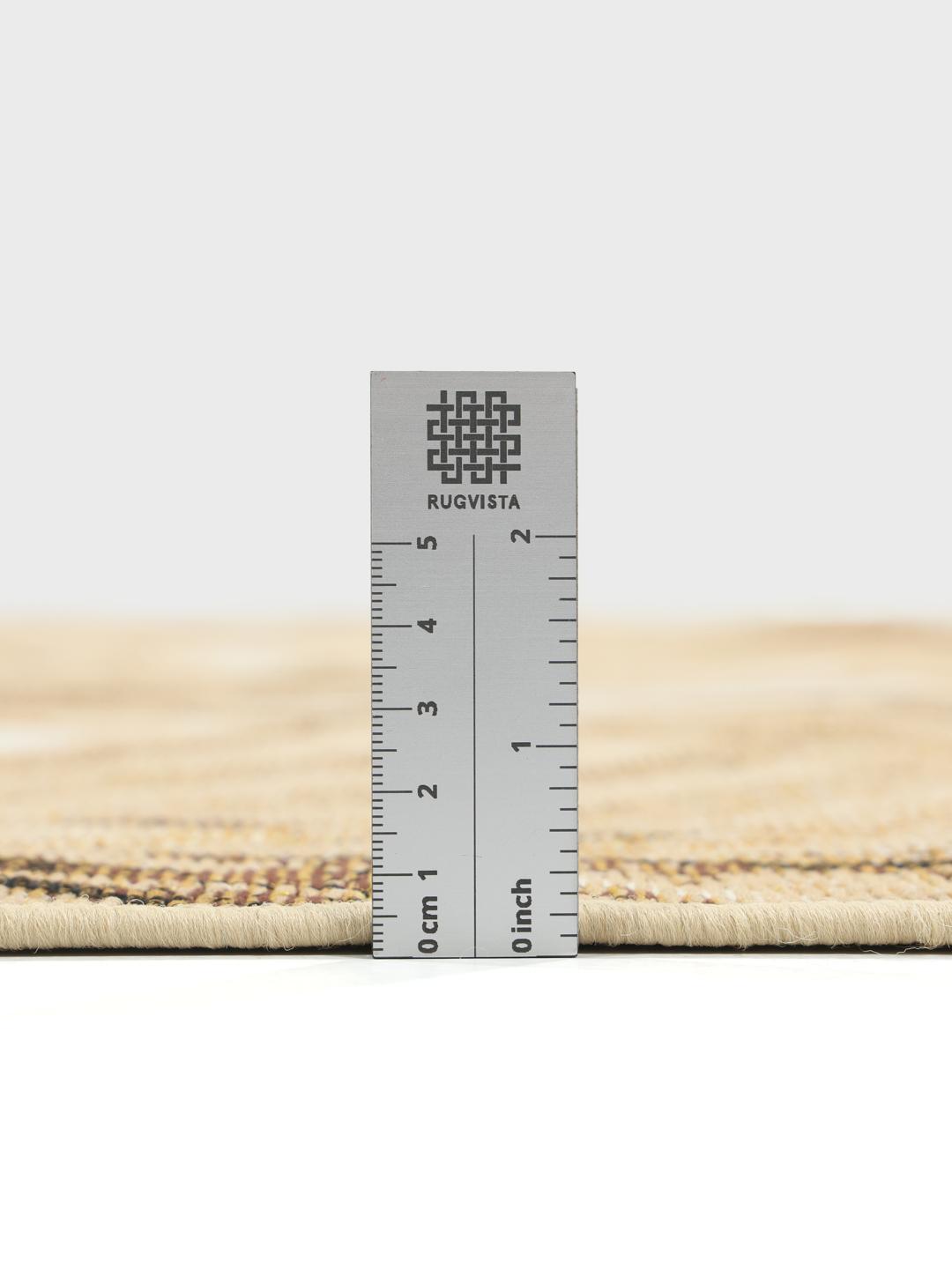 Tapis jaune et blanc avec motif de feuilles
