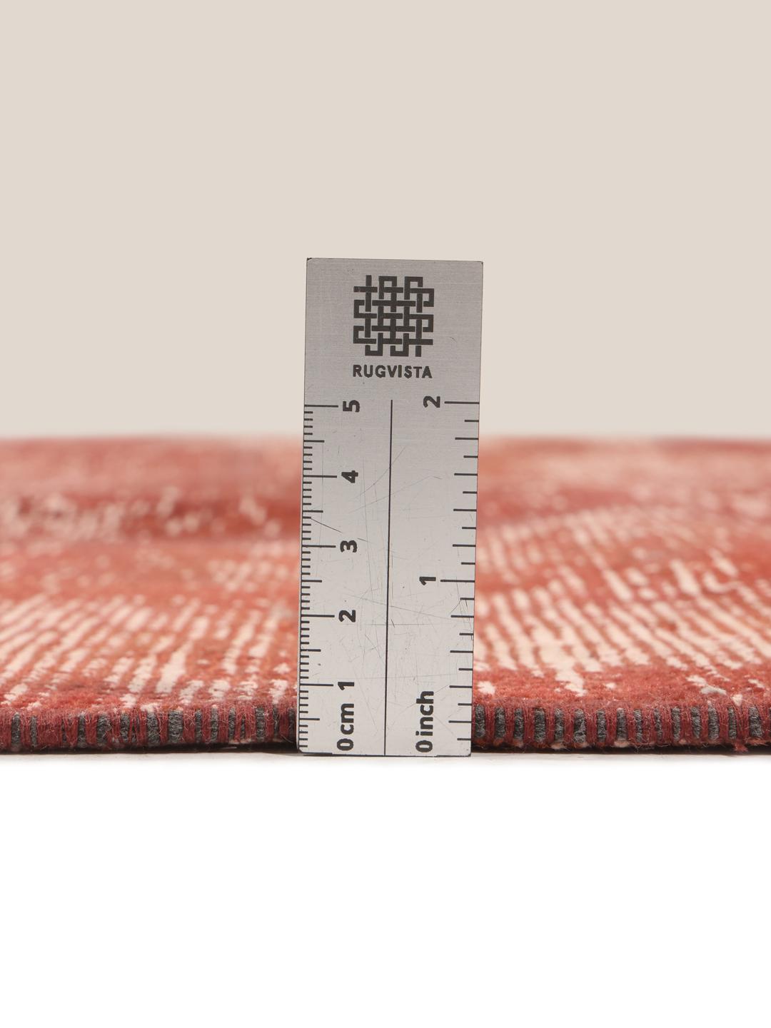 Patchwork rug from the Middle East in red tones