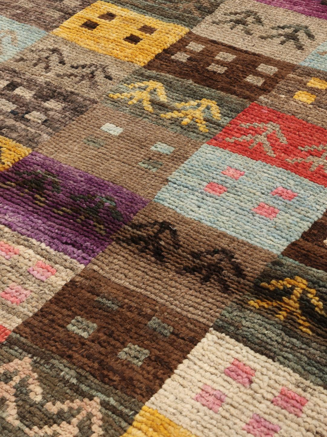 Handgeknoopt Afghaans Berber-tapijt met een kleurrijk patchworkontwerp en geometrische motieven