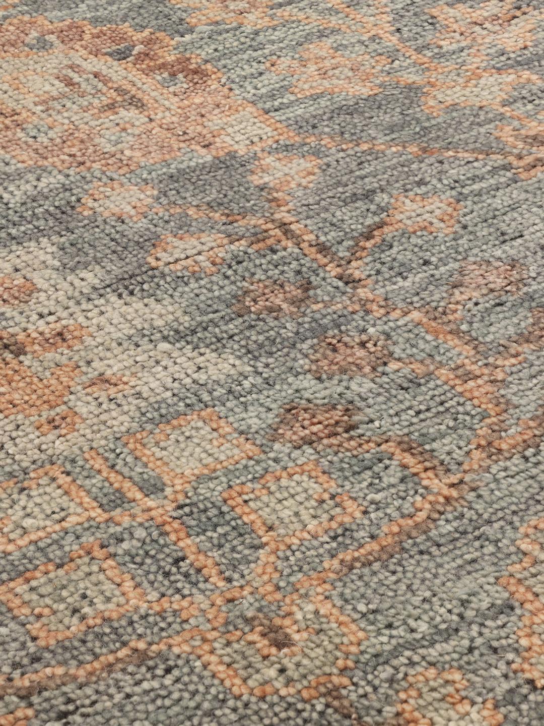 Handgeknoopt Usak Indo-tapijt uit India met bloemmotieven in blauw en beige