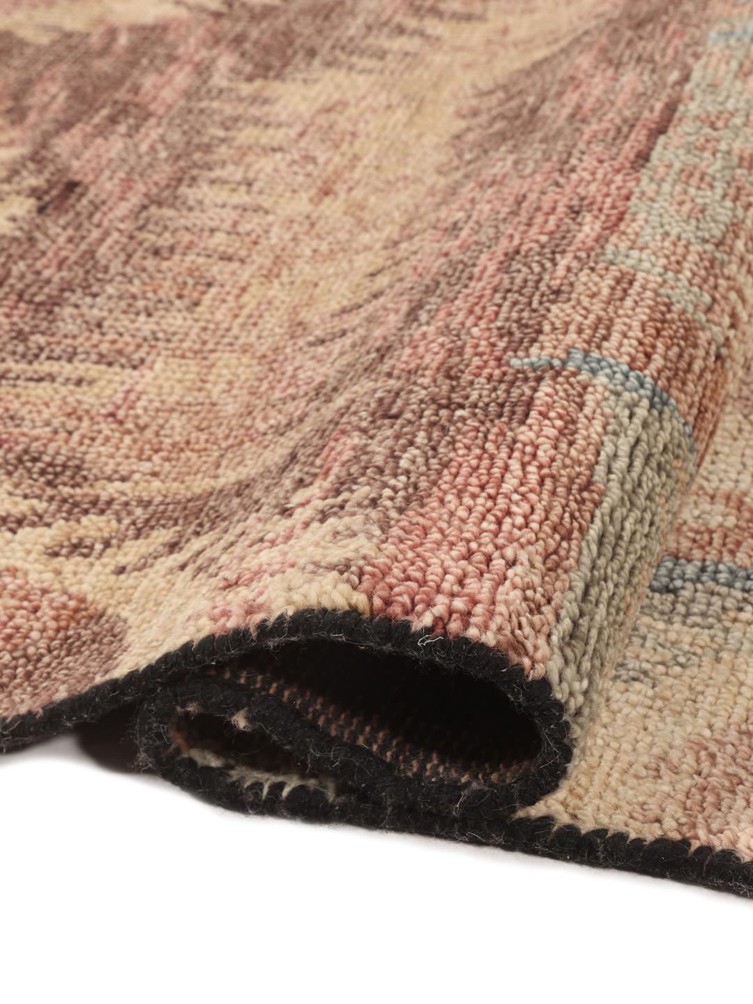 Alfombra Usak Indo anudada a mano con un diseño multicolor inspirado en medallones