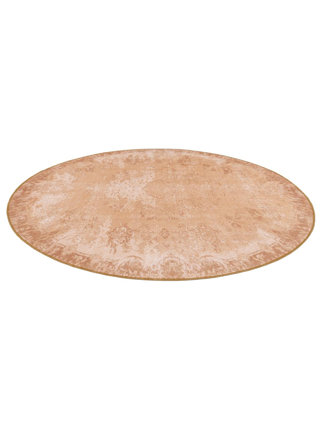 Rond goud vloerkleed met een traditioneel patroon