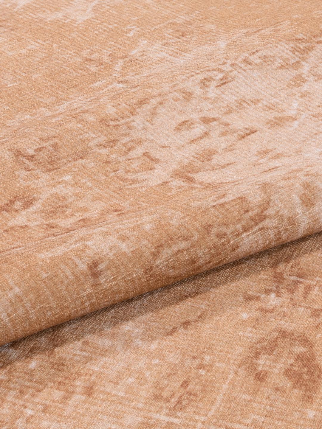 Rond goud vloerkleed met een traditioneel patroon