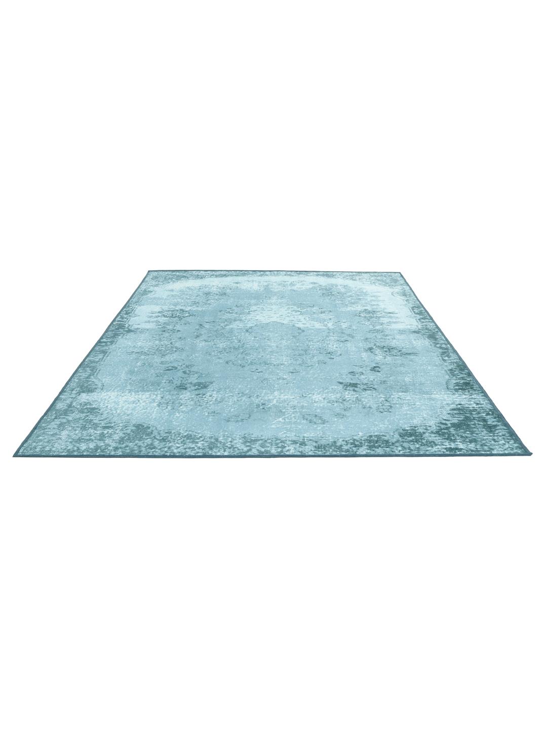 rechthoekig turquoise tapijt met geprint patroon