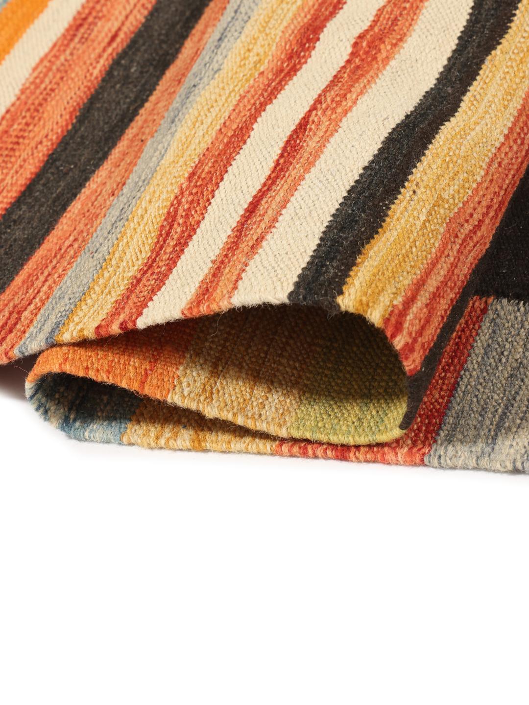 Ręcznie tkany afgański dywan typu kilim z żywymi, wielokolorowymi geometrycznymi pasami