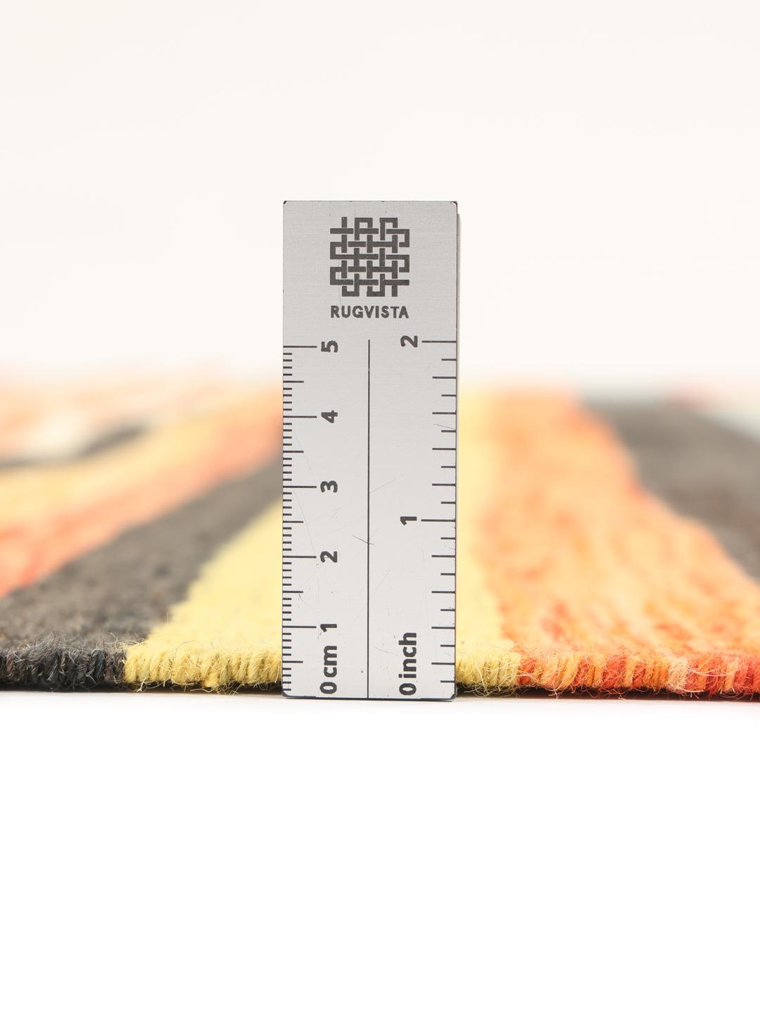 Ręcznie tkany afgański dywan typu kilim z żywymi, wielokolorowymi geometrycznymi pasami
